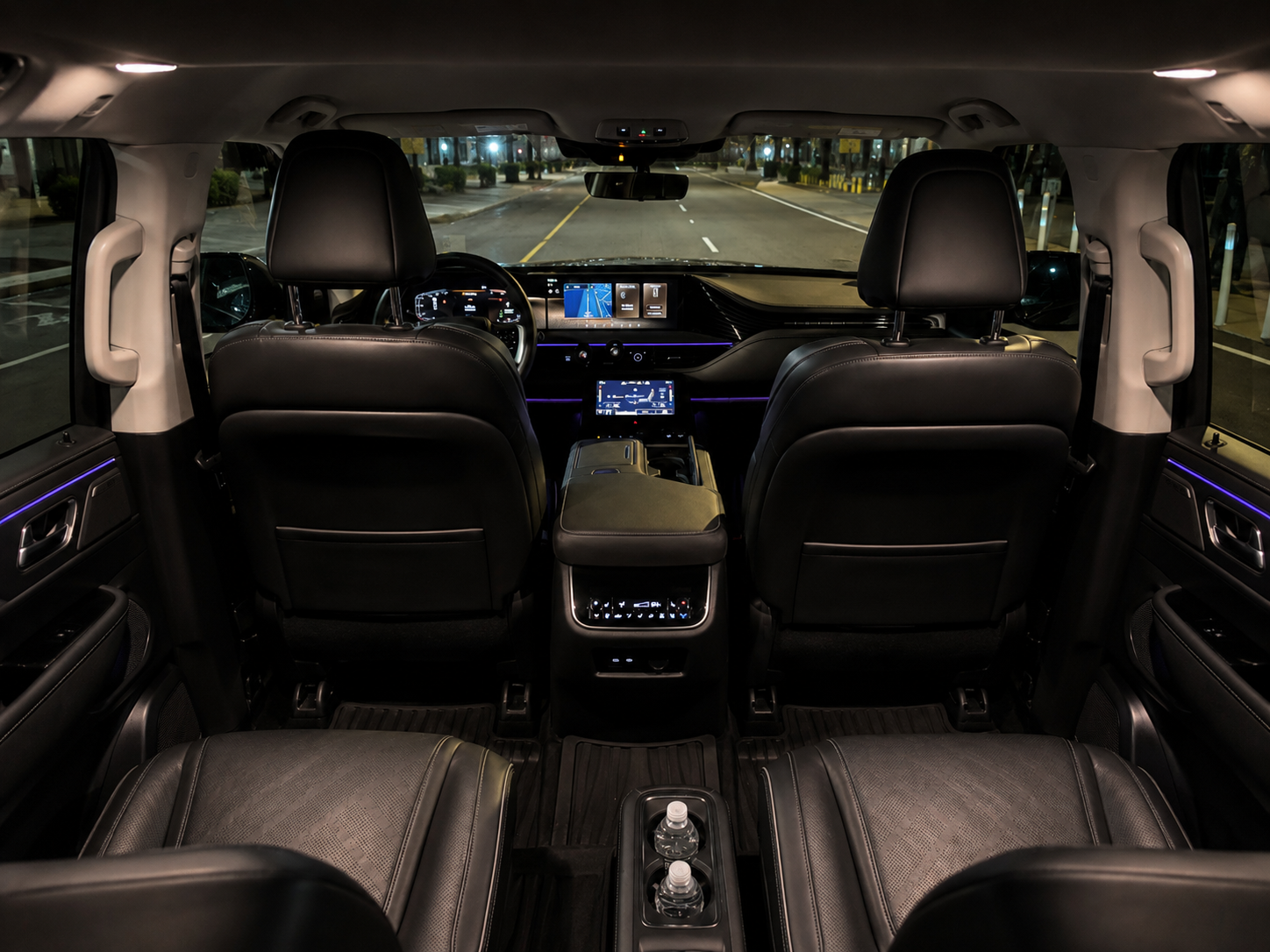 Infiniti QX80 interior — full cabin view with ambient lighting